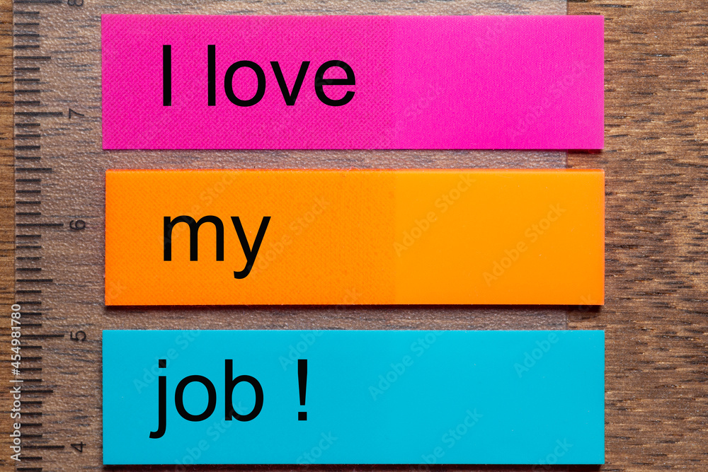 Three colored bookmark stickers with the words I love my job. on a dark  natural wooden table Stock-Foto | Adobe Stock