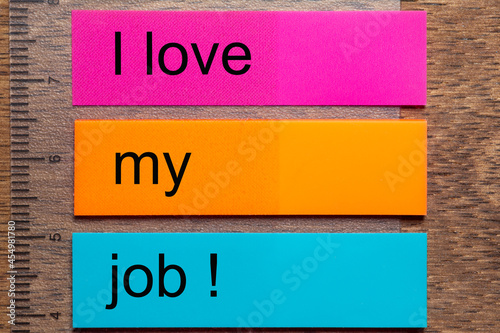 Konstfotografi Three colored bookmark stickers with the words I love my job