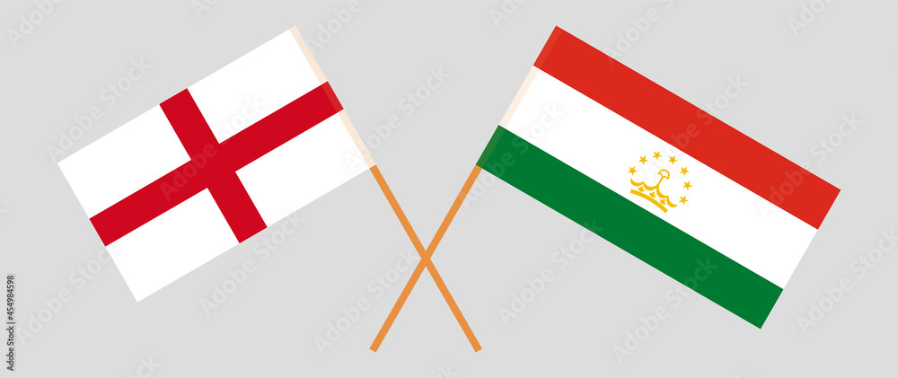 Crossed flags of England and Tajikistan. Official colors. Correct proportion