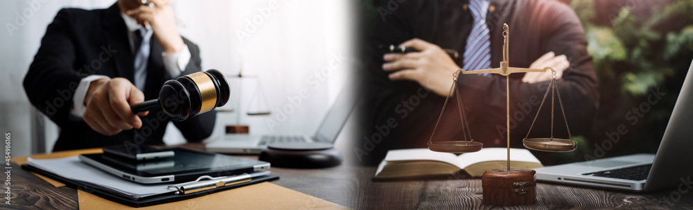 Business and lawyers discussing contract papers with brass scale on desk in office. Law, legal services, advice, justice and law concept picture with film grain effect Business and lawyers discussing contract papers with brass scale on desk in office. Law, legal services, advice, justice and law concept picture with film grain effect
