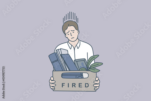 Feeling sad of being fired concept. Young man worker standing feeling stressed being fired holding box with belongings vector illustration 