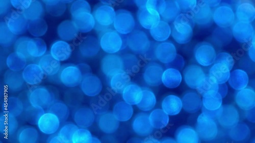 blue abstract background of blurred lights with bokeh effect