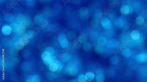blue abstract background of blurred lights with bokeh effect