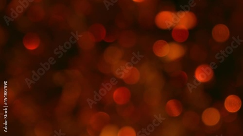 red abstract background of blurred lights with bokeh effect