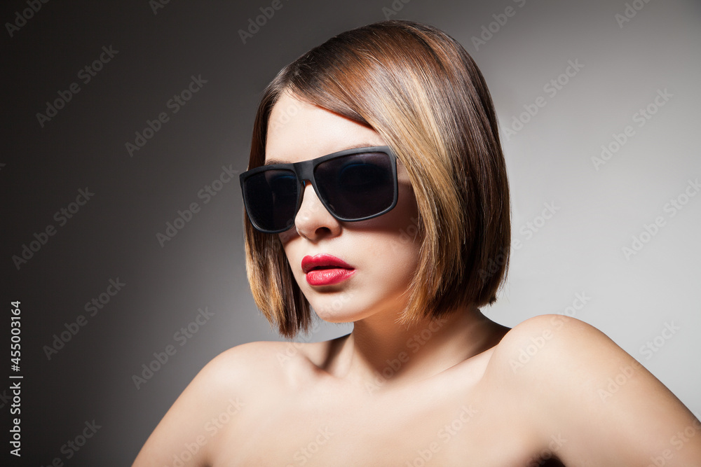 Beautiful young model with big glasses