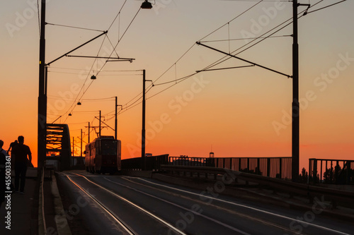 Silhouette of railway bridge with tram in Belgrade, Serbia