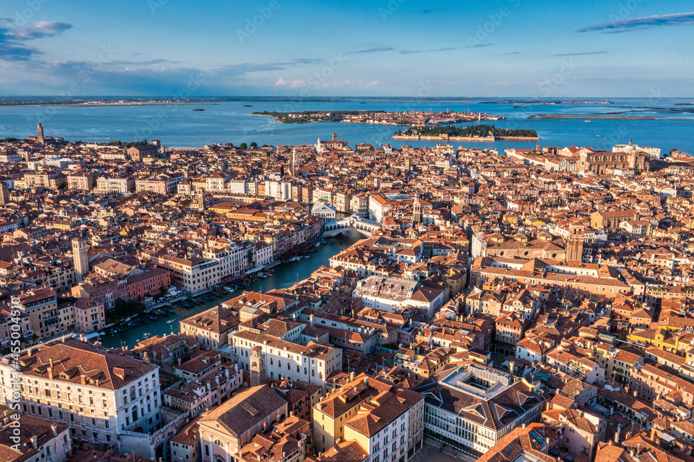 Beautiful orange roofs of Venice in Italy. Aerial view. Venice landmark from above.