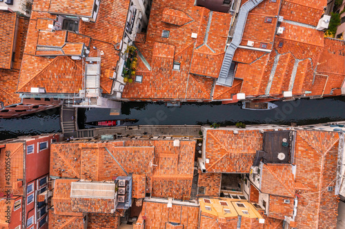 Beautiful orange roofs of Venice in Italy. Aerial view. Venice landmark from above.