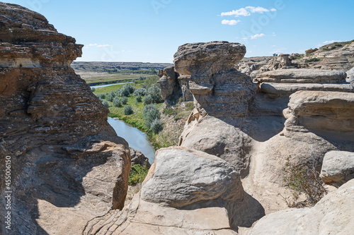 Rock formations on the edge of the Milk River in Writing on Stone Provincial Park in Alberta, Canada photo