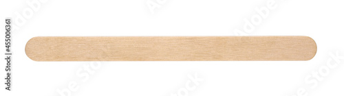 Wooden spatula for shugaring isolated on a white background. Disposable stick for wax and spa. photo