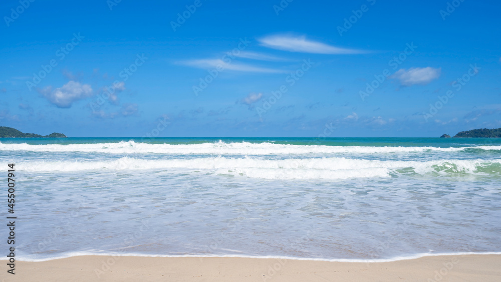 Summer season background Relax on the beach and tropical sea Blue clear sky over sea Amazing beach in Phuket Thailand in sunny day Good weather season travel day. Summer season background Relax on the beach and tropical sea Blue clear sky over sea Amazing beach in Phuket Thailand in sunny day Good weather season travel day.