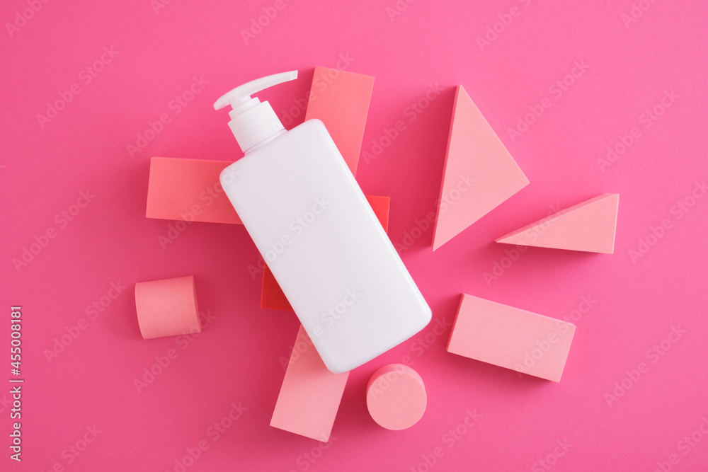 white mock up cosmetic bottle with dispenser and podiums, platform for product presentation on pink background white mock up cosmetic bottle with dispenser and podiums, platform for product presentation on pink background