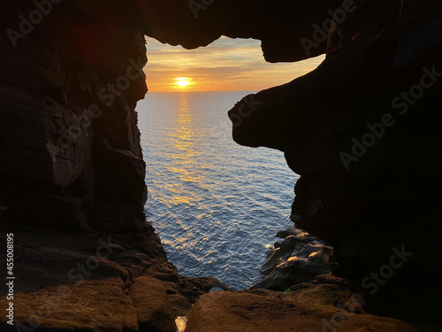 Sunrise through the Rocks, Arbroath, Scotland photo