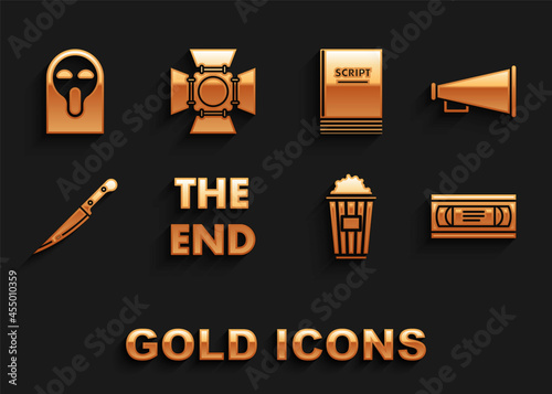 Set The End handwritten inscription, Megaphone, VHS video cassette tape, Popcorn cardboard box, Knife, Scenario, Funny scary ghost mask and Movie spotlight icon. Vector