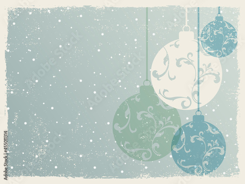 A distressed holiday ball ornament design with copyspace and grunge texture
