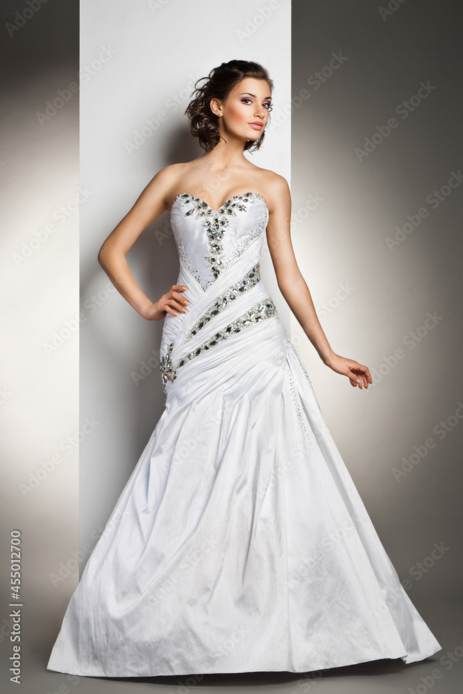 The beautiful young woman in a wedding dress The beautiful young woman in a wedding dress