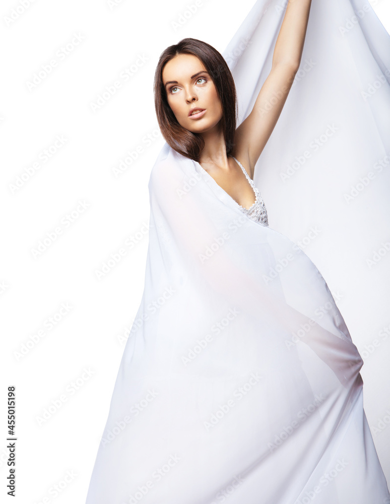 Romantic woman wearing white dress isolated Romantic woman wearing white dress isolated