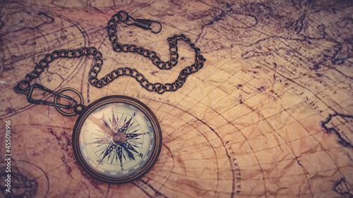 old compass on map