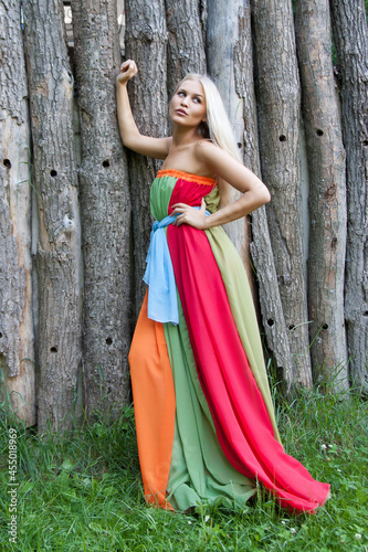 Sexy woman outdoor with nice colorful dress © julenochek