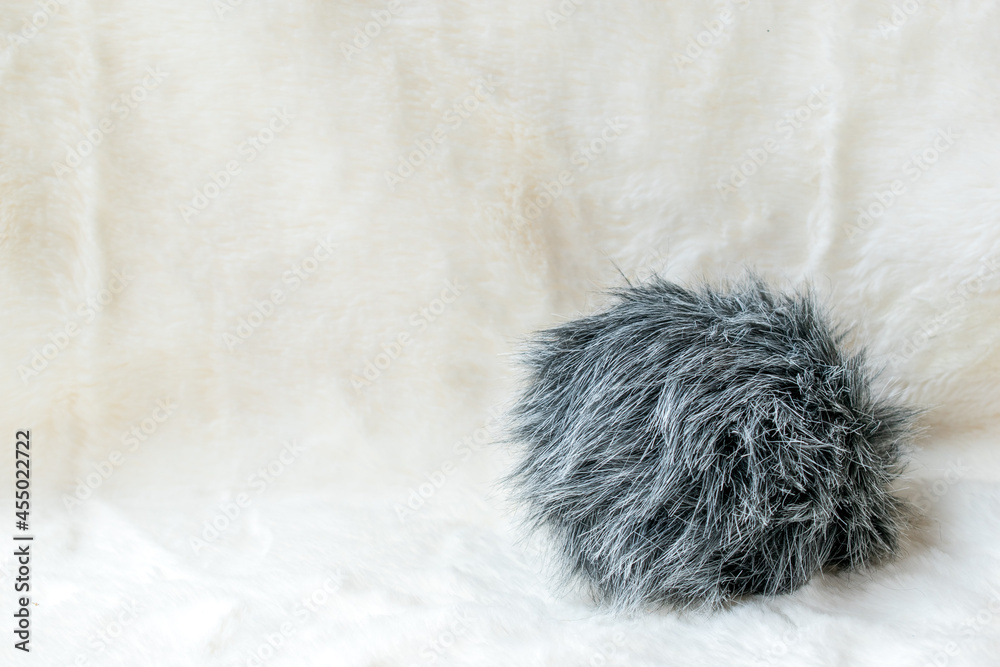 gray fur on white fur background gray fur on white fur background