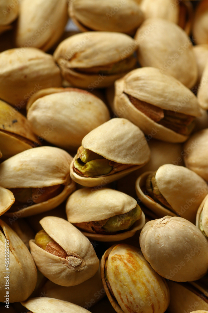 Obraz premium Pistachios are a great source of healthy fats, fiber, protein, antioxidants and various nutrients including vitamin B6 and thiamine