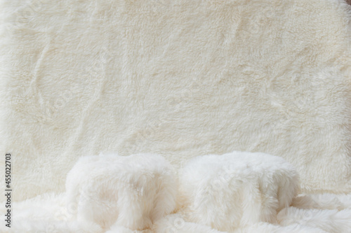 white cream fur fabric background podium