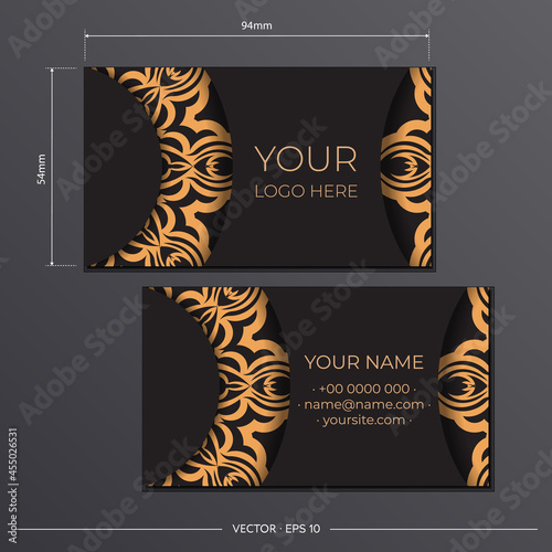 Business card preparation with Greek ornament. Black business card design with vintage patterns.