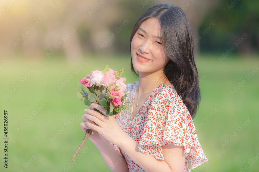 Young beautiful Asian woman enjoying her time on picnic blanket in beautiful natural park
Young beautiful Asian woman enjoying her time on picnic blanket in beautiful natural park