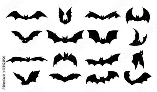 Bat silhouettes. Halloween flying night creatures shapes. Scary autumn party decorative elements. Creepy animals waving wings. Isolated black predators flight. Vector mystery vampire set