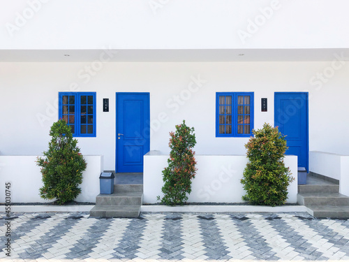 Front Door and Porch of an Exterior View of an blue Town House