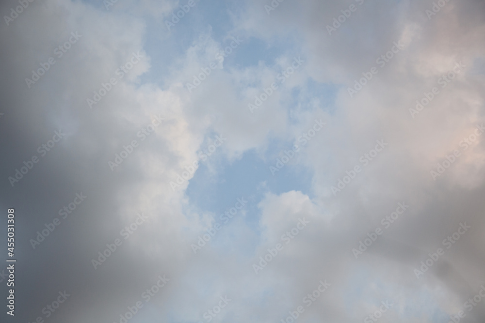 gray clouds against the background of the morning blue sky, dawn. gray clouds against the background of the morning blue sky, dawn.