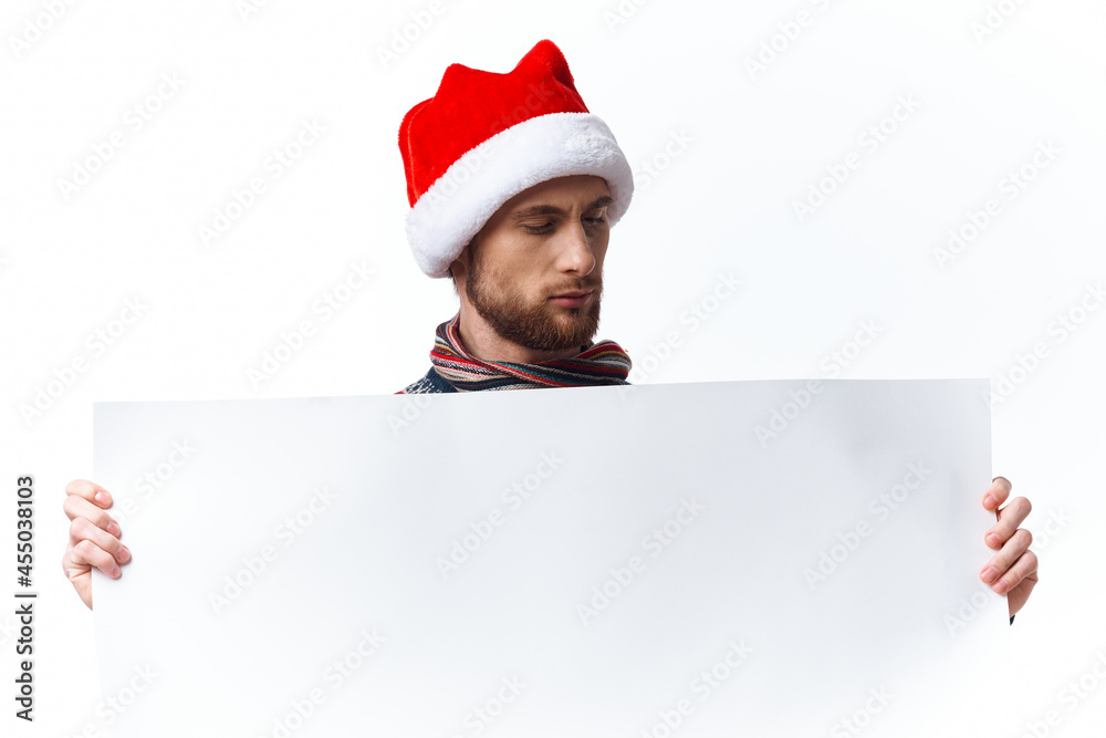 emotional man in New Year's clothes holding a banner holiday isolated background emotional man in New Year's clothes holding a banner holiday isolated background