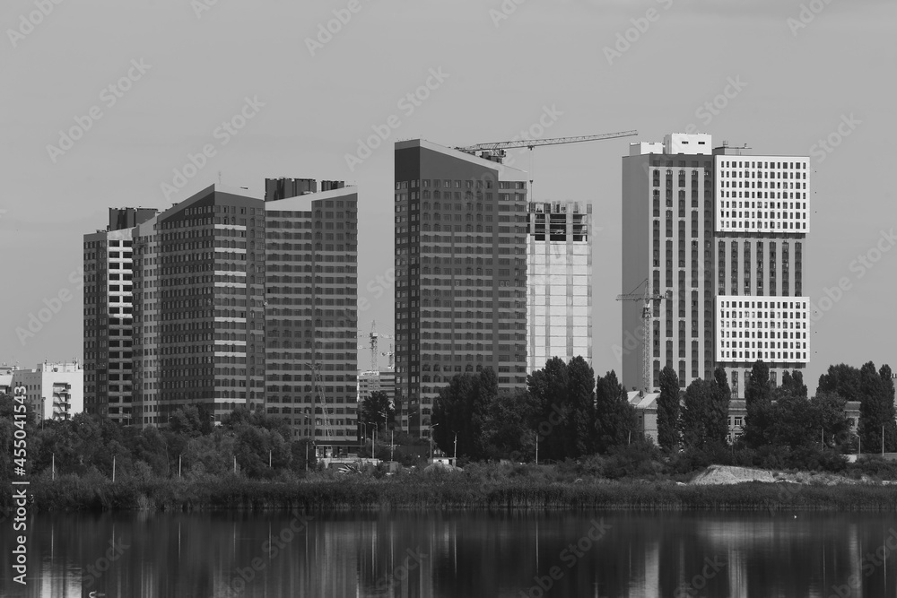 Fototapeta premium Urban landscape at the lake in black and white