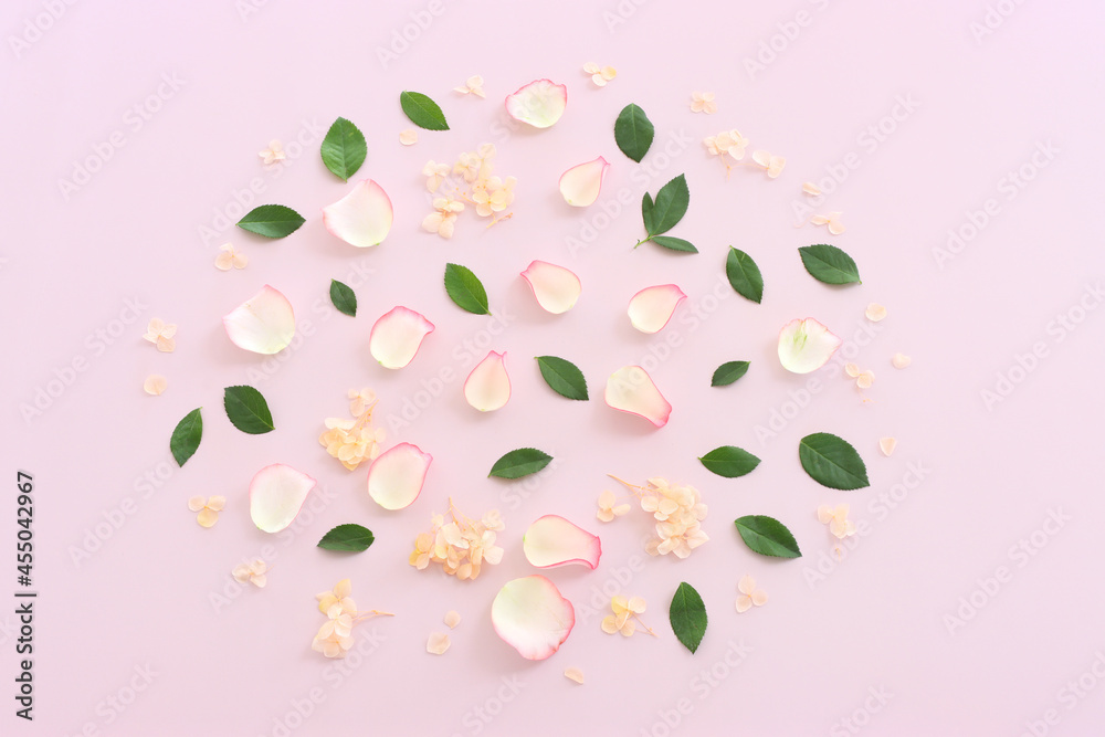 Pastel delicate background with pink roses and petals. Top view Pastel delicate background with pink roses and petals. Top view
