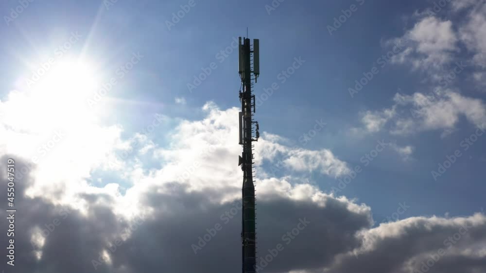 a modern cell phone tower against a cloudy sky 4k video a modern cell phone tower against a cloudy sky 4k video