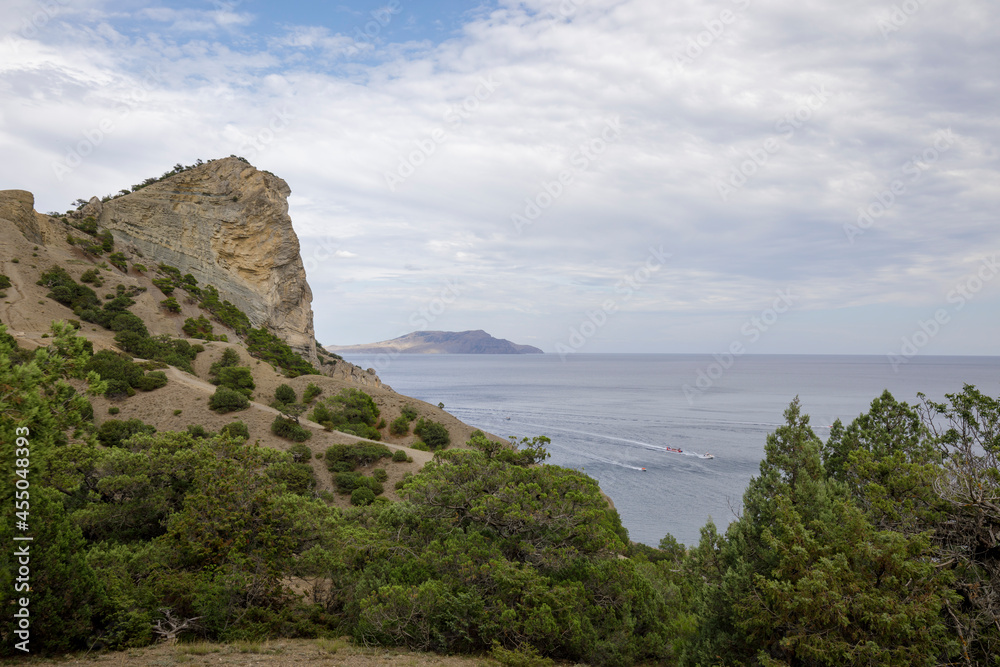 Black sea promenade with mountains and hills. Landscape of mountains and sea. Black sea promenade with mountains and hills. Landscape of mountains and sea.