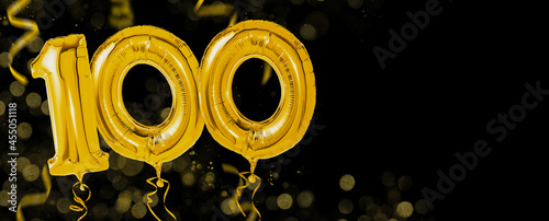 Golden balloons with copy space - Number 100 photo