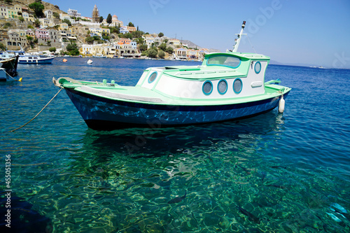 small boat in the harbor of symi © chriss73