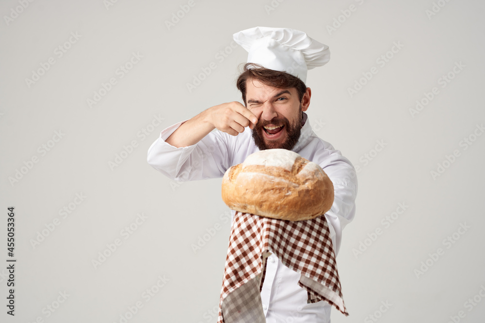 Baker with bread in hand isolated background