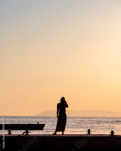 Women on the beach during sunset