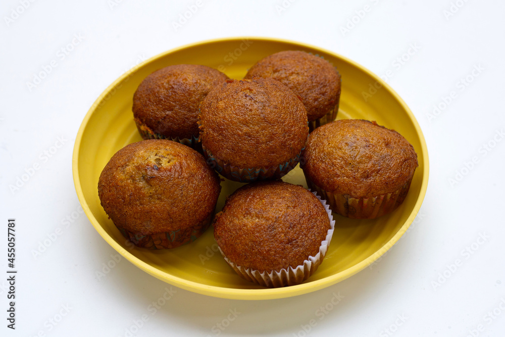 Banana Cupcakes in plate on white background. Banana Cupcakes in plate on white background.