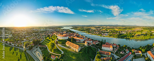 Aerial Panorama over Ptuj Townscape, Ptuj Castle and River Drava in Slovenia photo