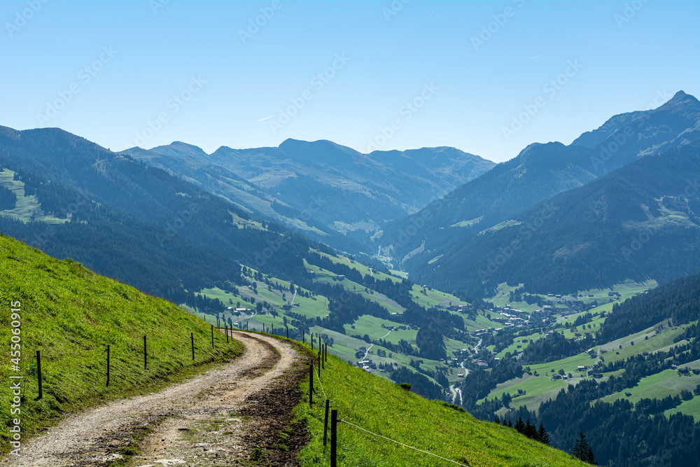 Hiking trail with a panoramic maintain view in the Austrian Alps