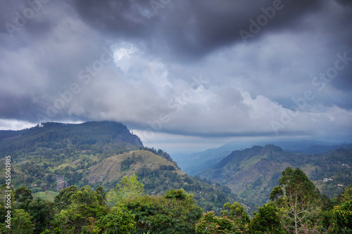 Green Hills And Blue Sky With Dramatic Clouds