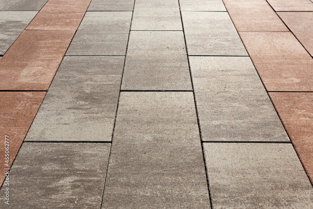 Visual zoning of space using paving with tiles of different colors. Selective focusing.