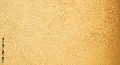 Abstract background from stucco concrete wall with sunlight, light and shadow
