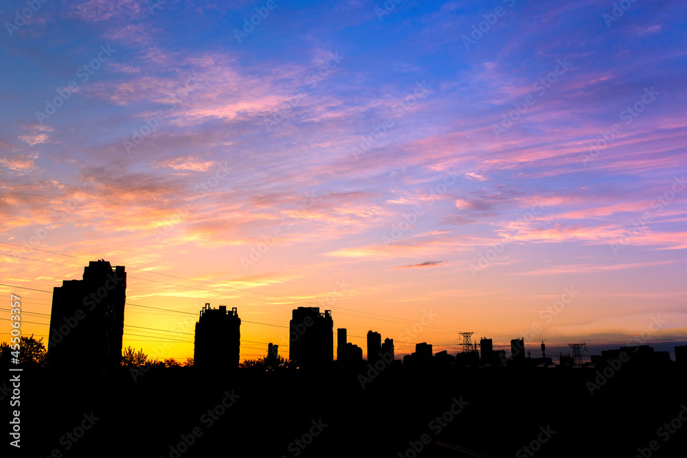 A beautiful view of the city skyline in the early morning, just before sunrise