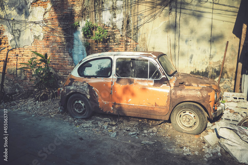fiat old vintage classic car brown sepia tone old concrete broken brick background timeless