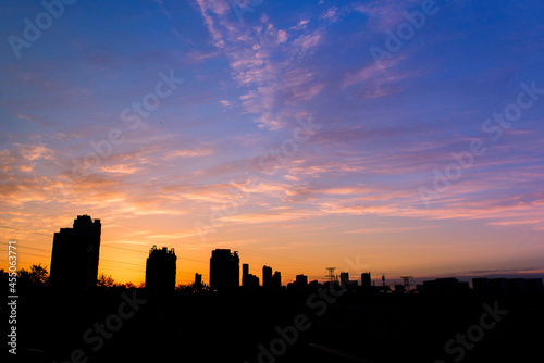 A beautiful view of the city skyline in the early morning, just before sunrise © Xiangli