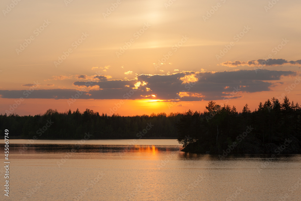 dravatic sunset over the lake
